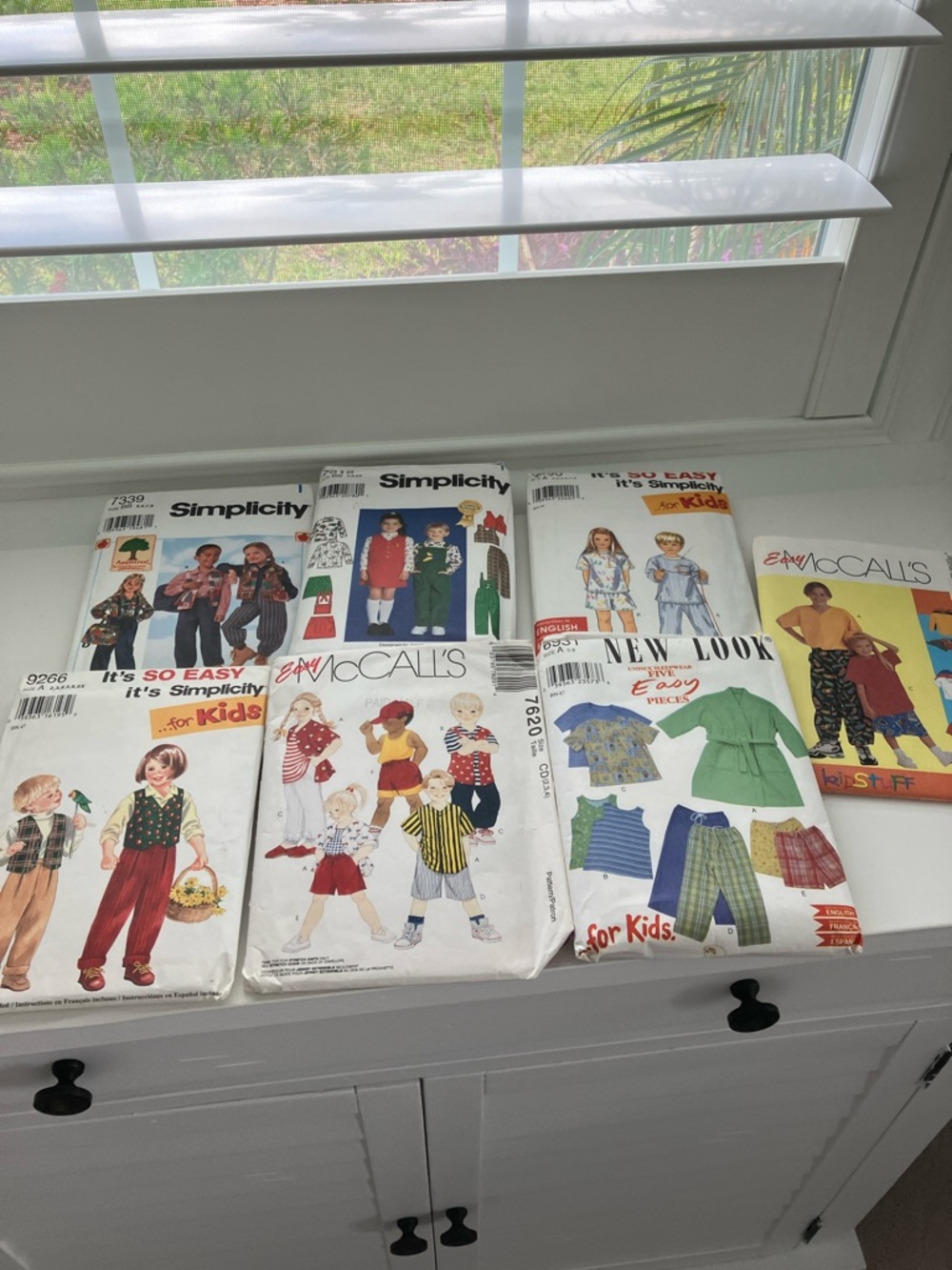 Seven children’s sewing patterns size is 3–8